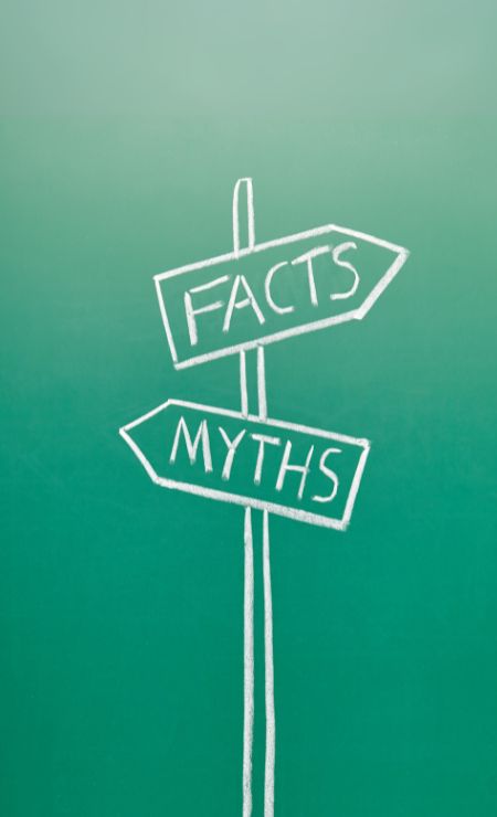 Cybersecurity facts versus myths signpost illustration.
